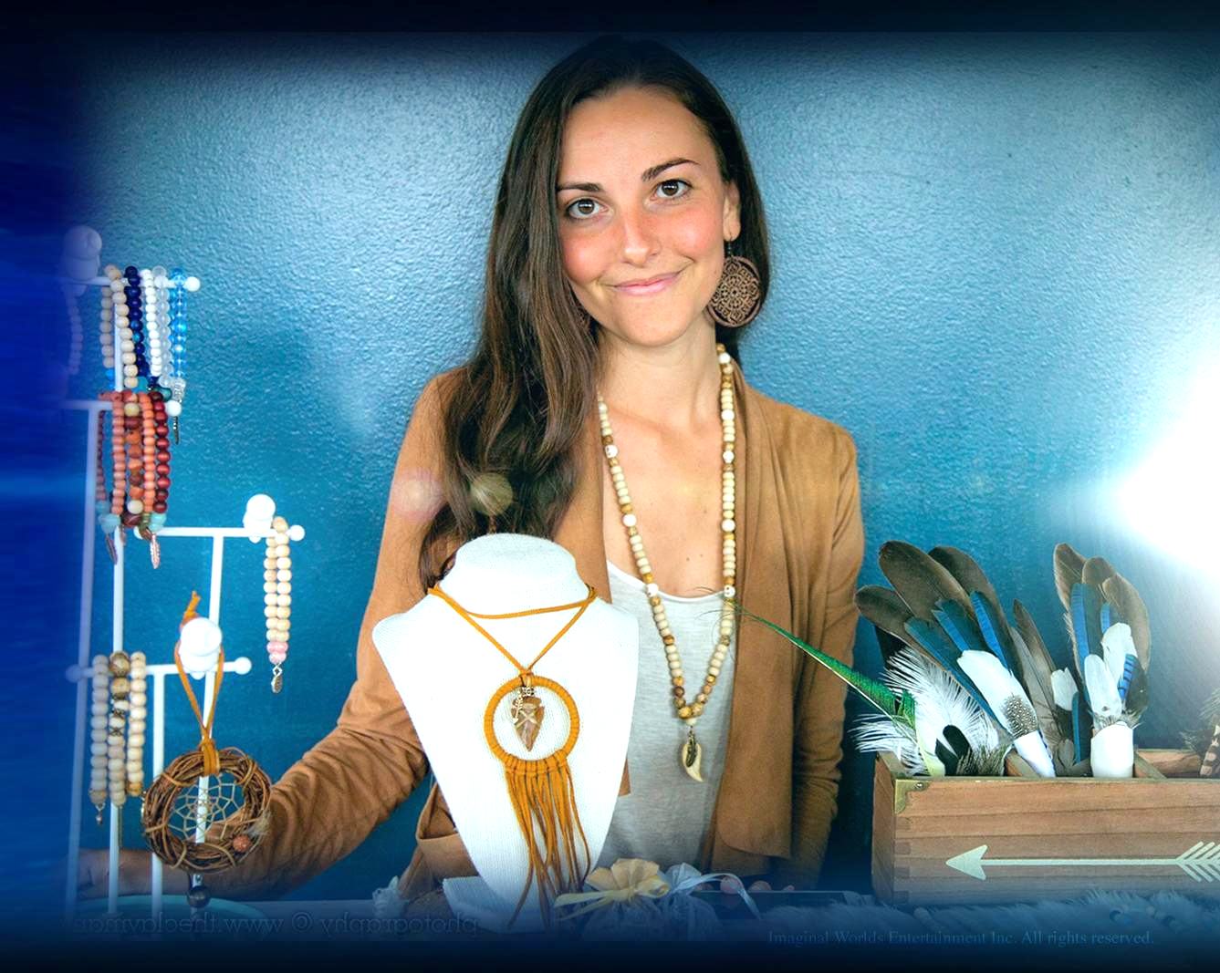 A vendor with her jewellery table at a UNITE event